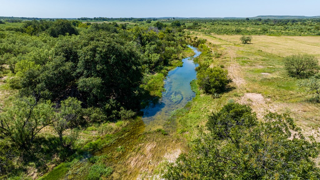 16251 Door Key Road San Angelo, TX 76904 - Photo 2 of 69 a view of a lake with an outdoor space