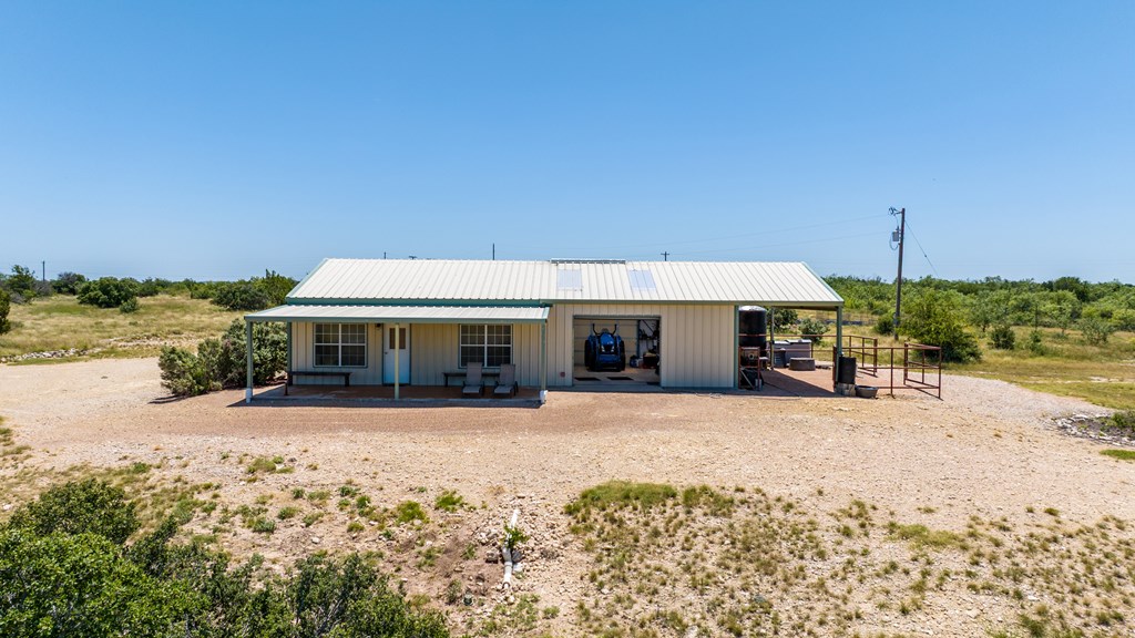 16251 Door Key Road San Angelo, TX 76904 - Photo 24 of 69 a view of a house with backyard and sitting area