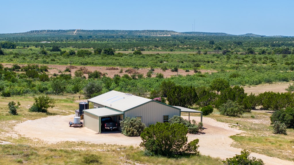 16251 Door Key Road San Angelo, TX 76904 - Photo 26 of 69 an aerial view of a house with a yard