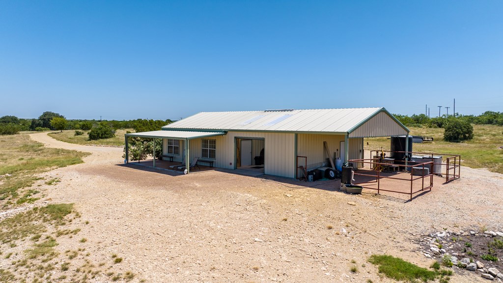 16251 Door Key Road San Angelo, TX 76904 - Photo 5 of 69 a view of a house with wooden bench and floor