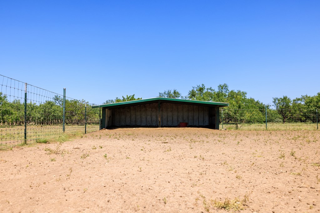 16251 Door Key Road San Angelo, TX 76904 - Photo 59 of 69 a wooden building with snow in the background