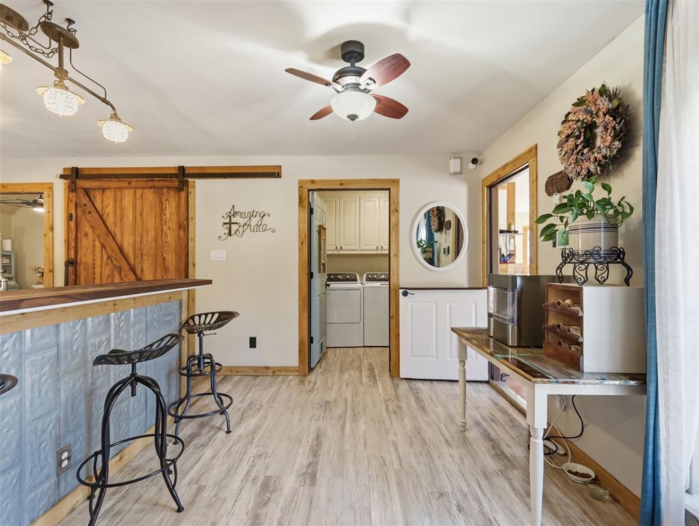 3823 State Highway Bonham, TX 75418 - Photo 18 of 37 a living room with furniture and wooden floor
