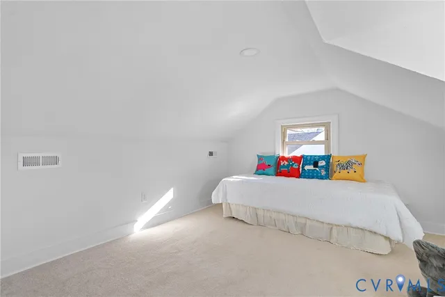 a living room with a couch and a table