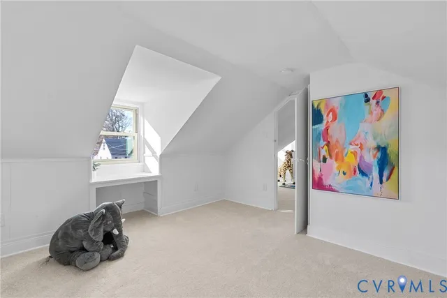 a picture of room with toys and wooden floor