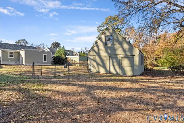 a view of a yard in front of a house