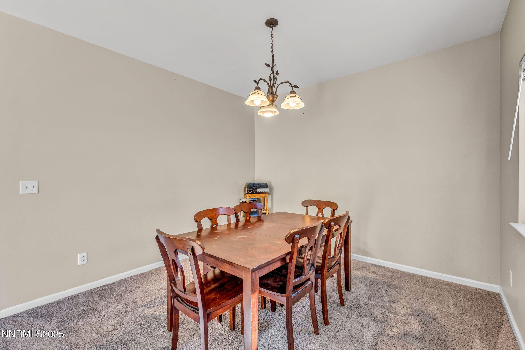 1295 Eider Circle Fallon, NV 89406 - Photo 16 of 37 a dining room with furniture and chandelier