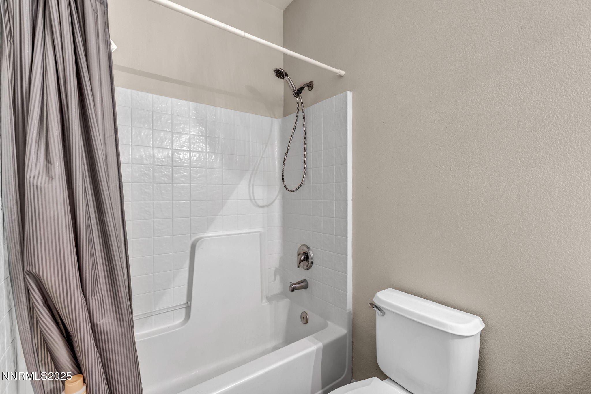 1295 Eider Circle Fallon, NV 89406 - Photo 20 of 37 a bathroom with a shower and a toilet