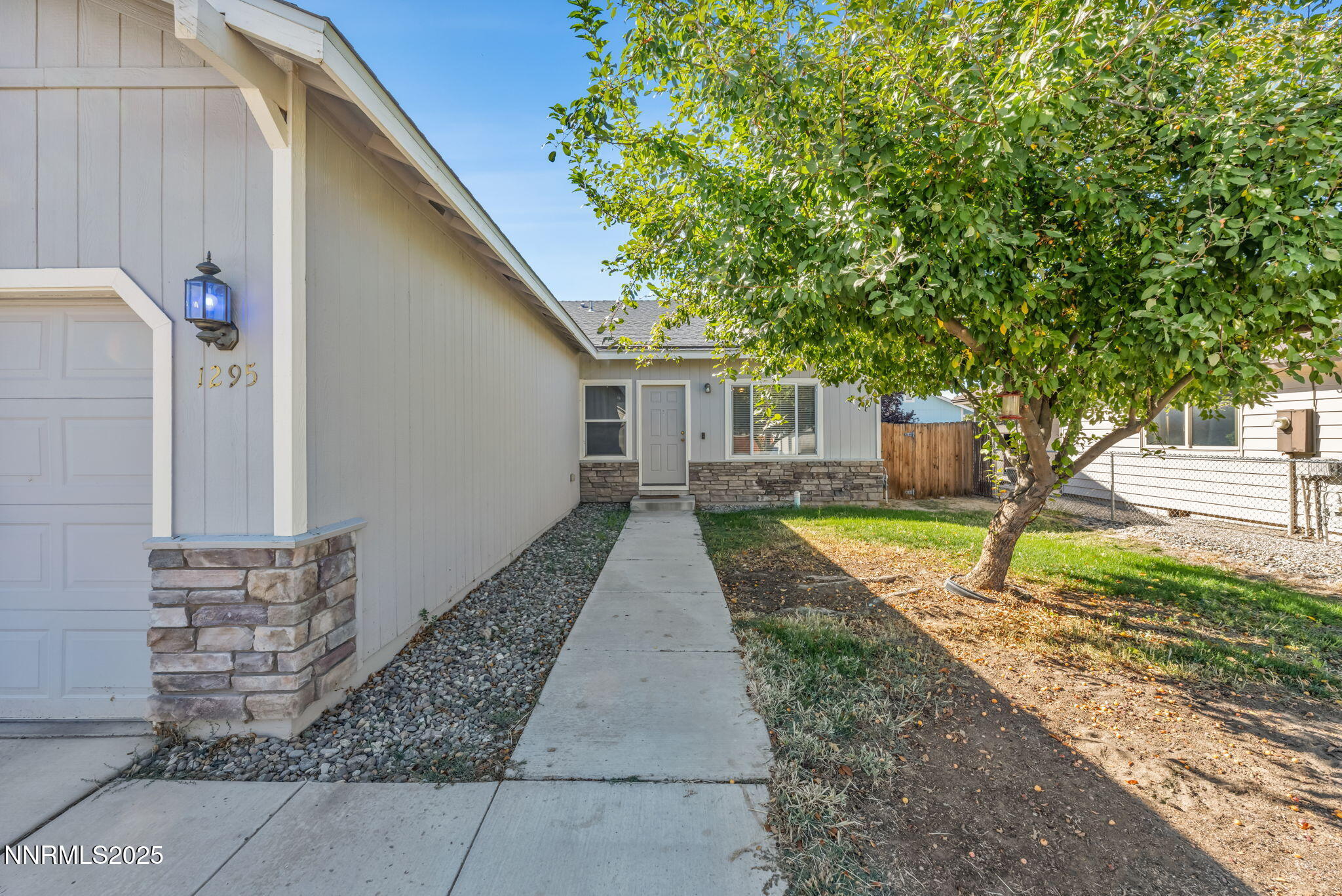 1295 Eider Circle Fallon, NV 89406 - Photo 2 of 37 front view of a house with a yard