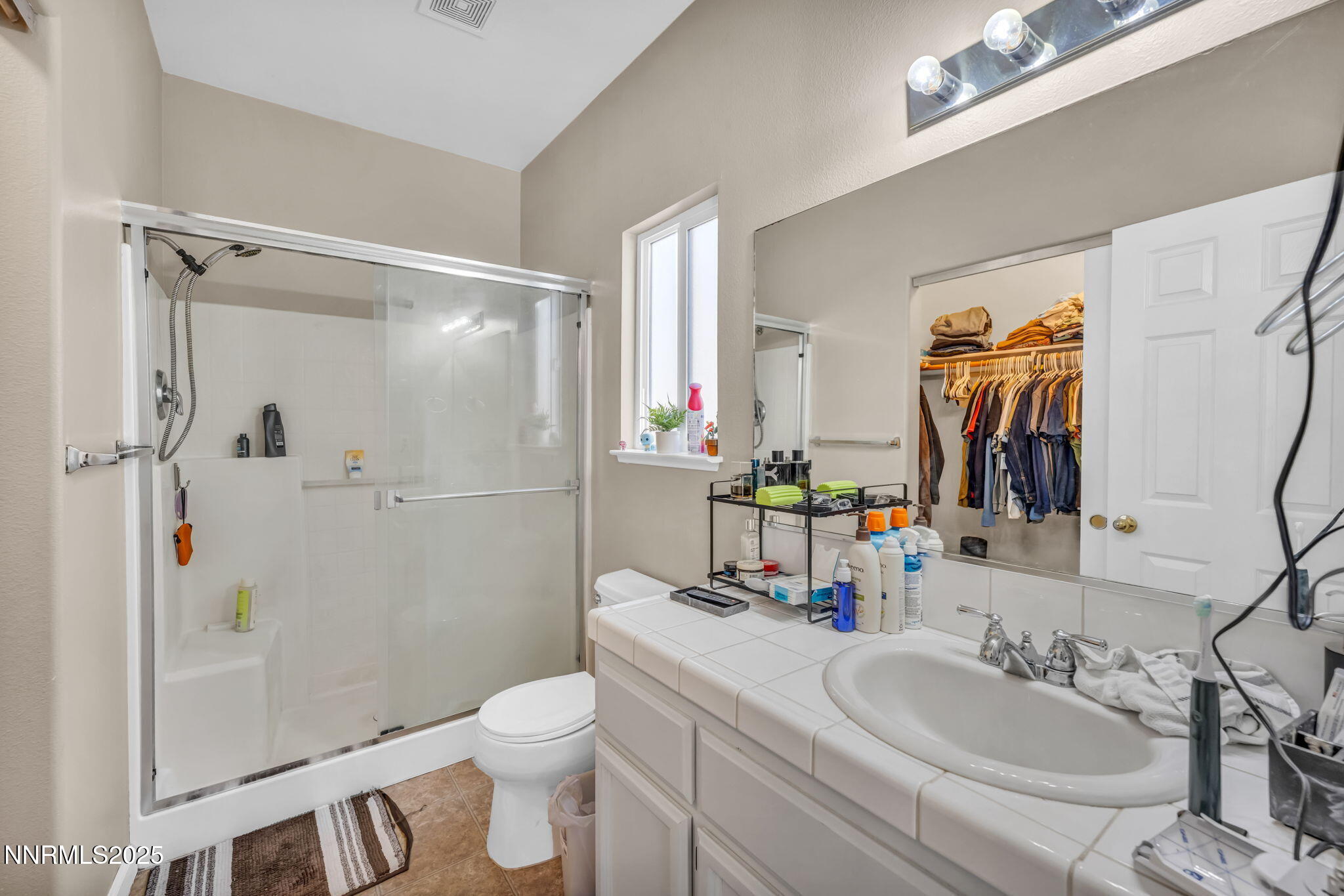 1295 Eider Circle Fallon, NV 89406 - Photo 24 of 37 a bathroom with a sink a toilet and shower