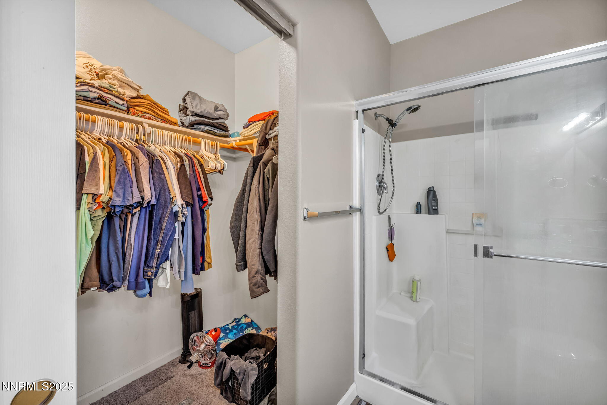 1295 Eider Circle Fallon, NV 89406 - Photo 26 of 37 a view of walk in closet with clothes