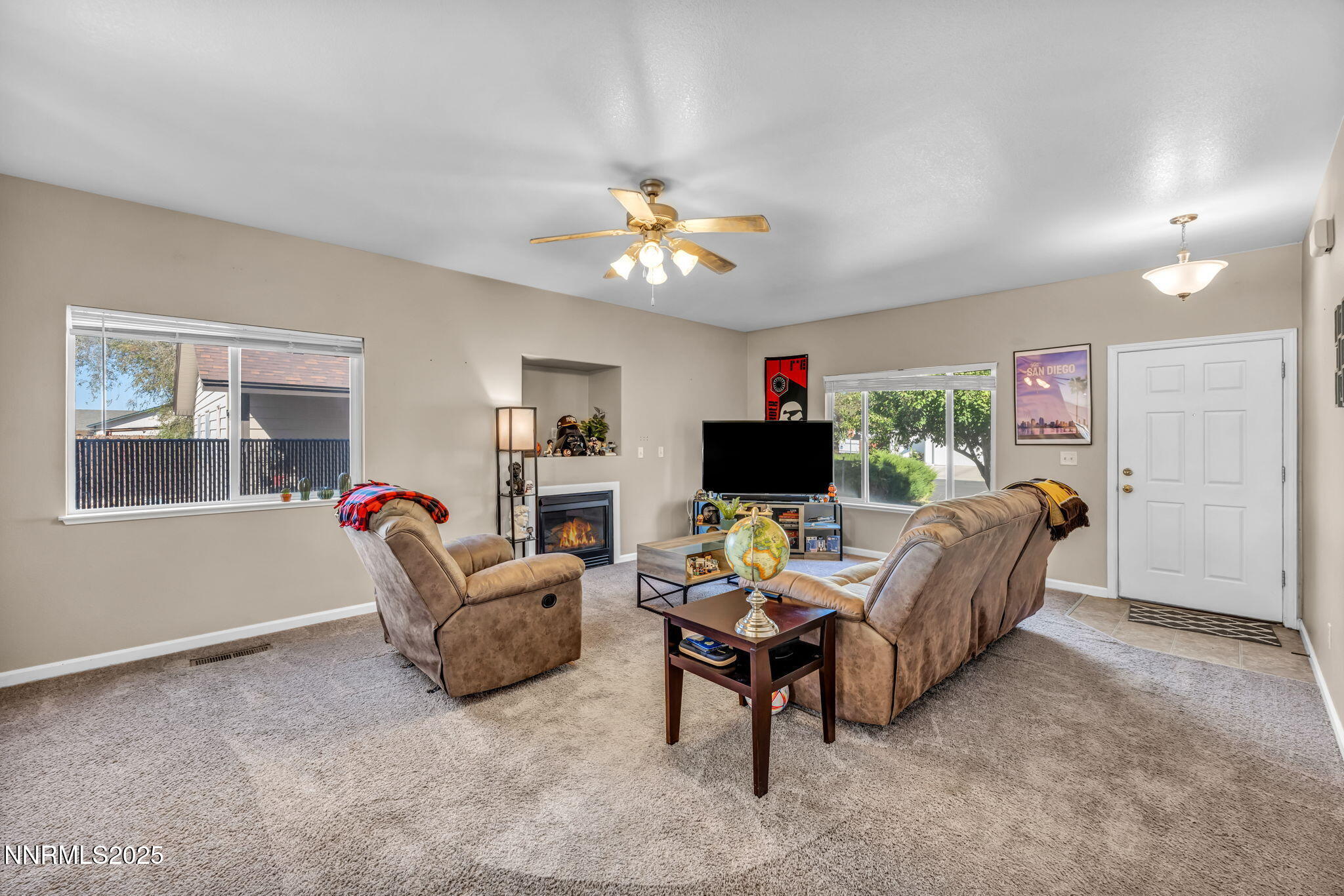 1295 Eider Circle Fallon, NV 89406 - Photo 7 of 37 a living room with furniture and a flat screen tv