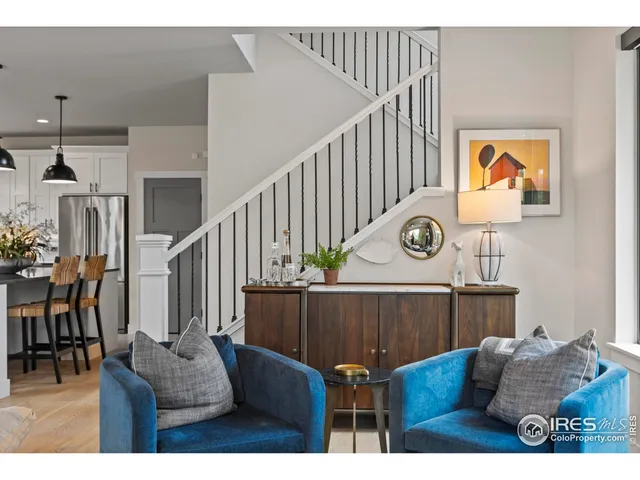 a view of entryway dining room and hall with wooden floor