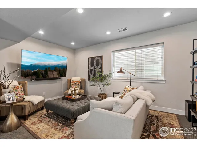 a room with furniture and wooden floor