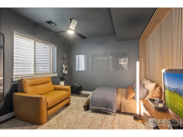 a bathroom with a shower and toilet