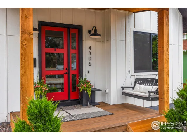 a view of front door and yard