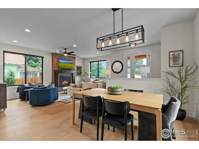 a kitchen with a table and chairs in it