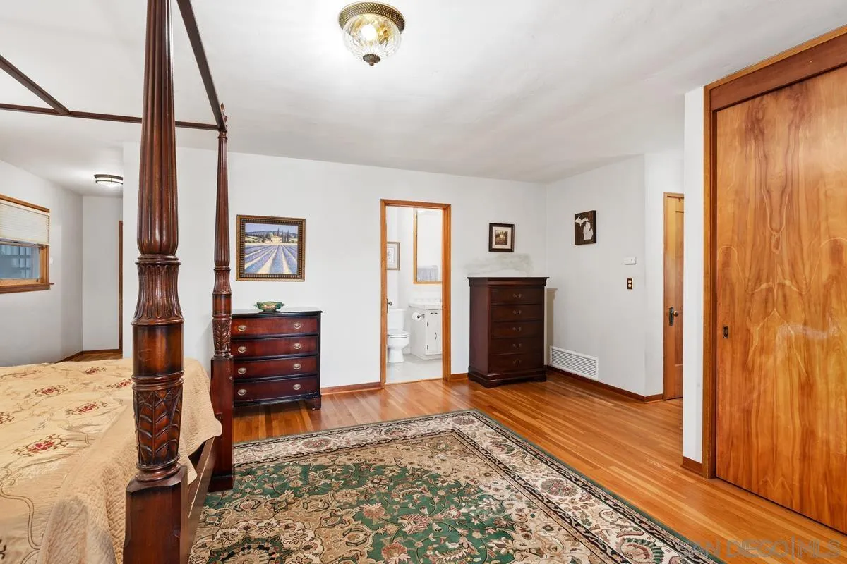 1675 Chase Lane El Cajon, CA 92020 - Photo 16 of 32 a bedroom with furniture and a rug