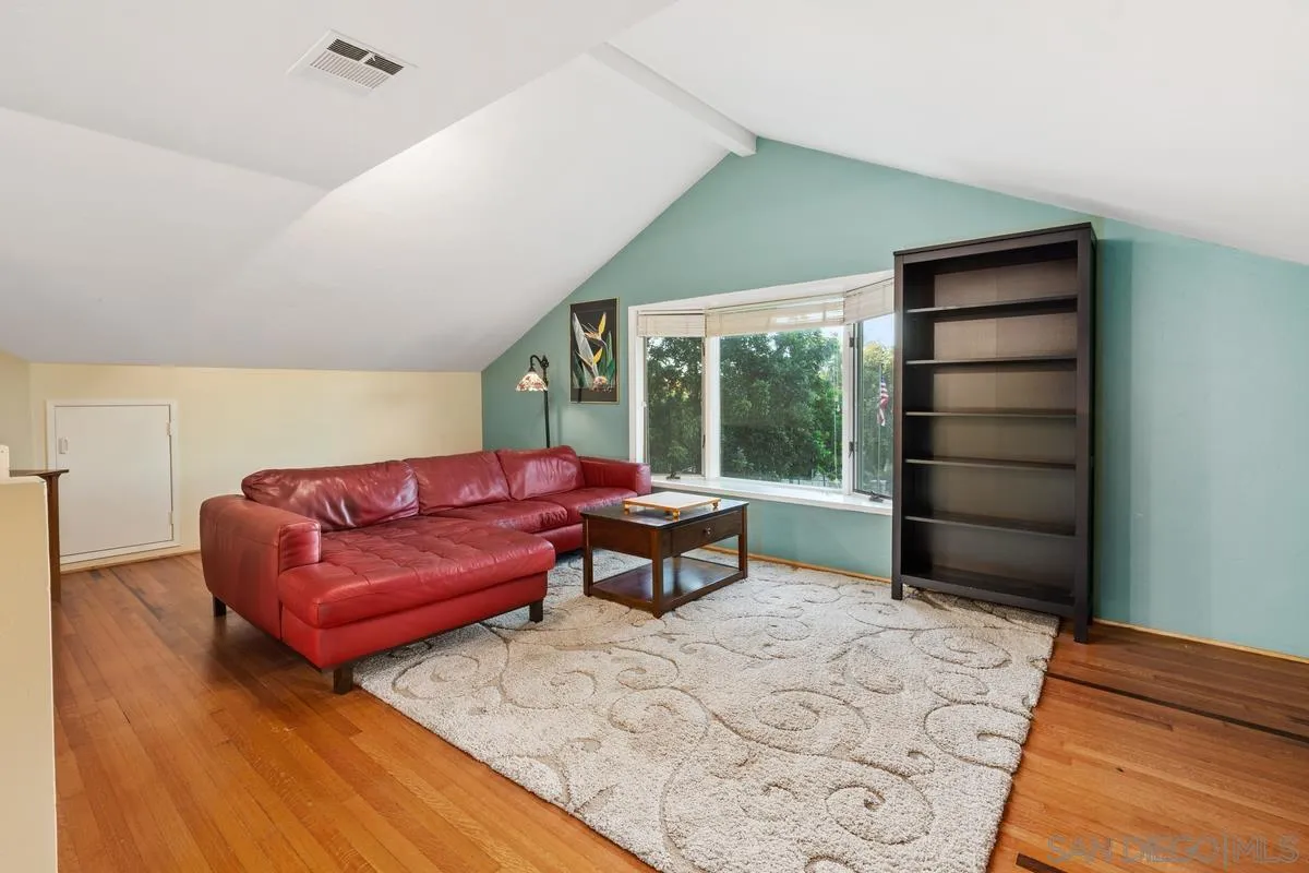 1675 Chase Lane El Cajon, CA 92020 - Photo 19 of 32 a living room with a couch and a dresser