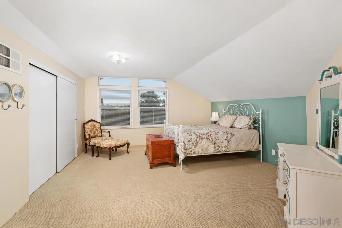 1675 Chase Lane El Cajon, CA 92020 - Photo 21 of 32 a bedroom with furniture and window