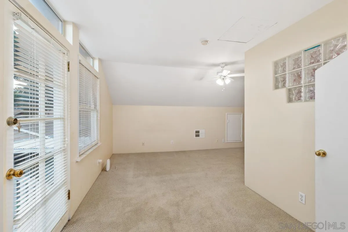 1675 Chase Lane El Cajon, CA 92020 - Photo 23 of 32 a view of a room with a window and brick walls