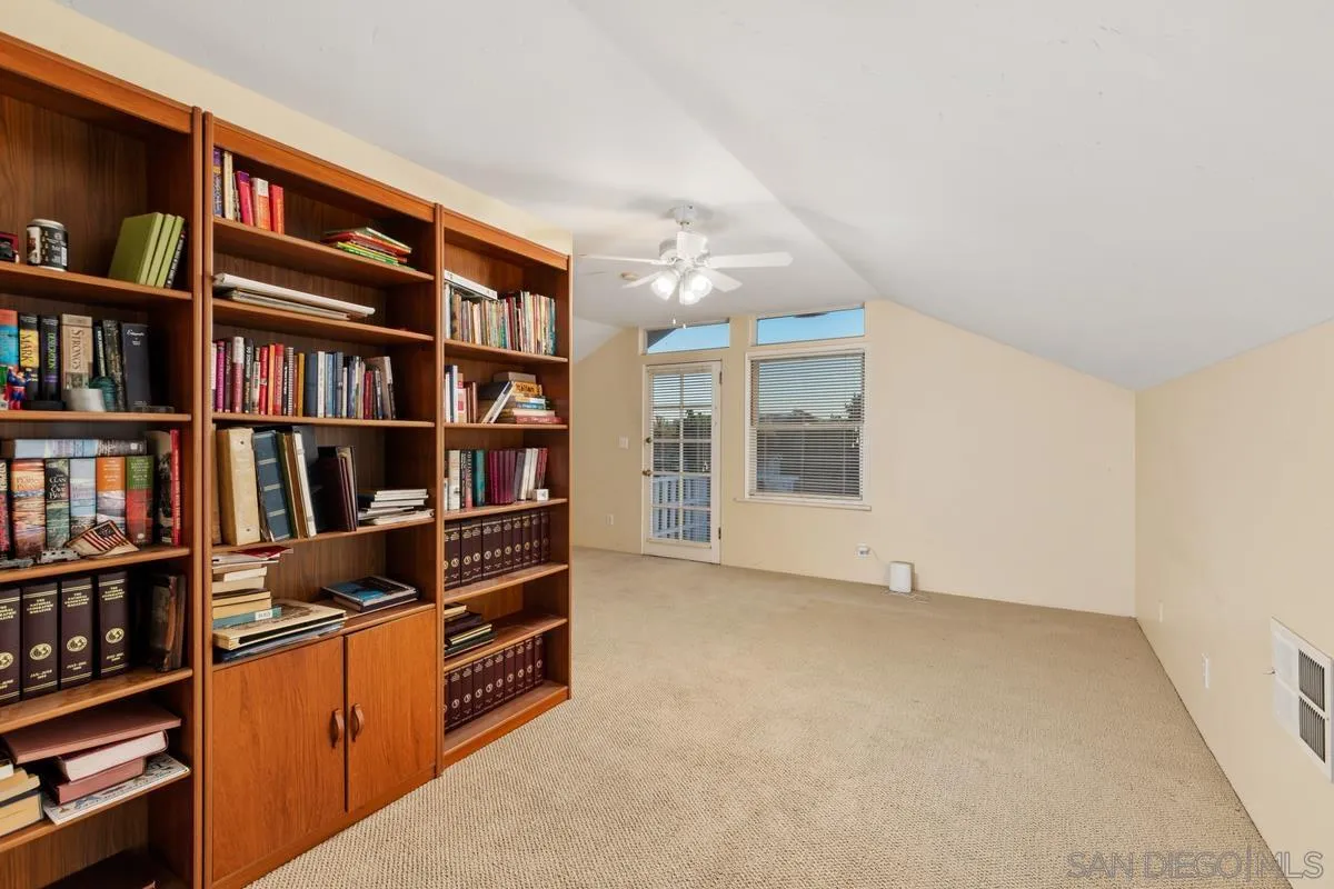 1675 Chase Lane El Cajon, CA 92020 - Photo 24 of 32 a view of an empty room with shelves
