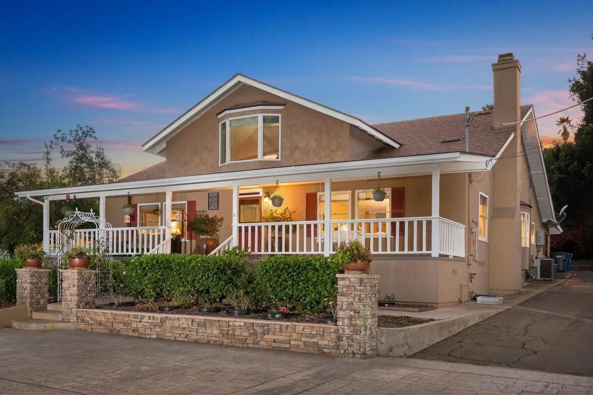 1675 Chase Lane El Cajon, CA 92020 - Photo 8 of 32 a front view of a house with a yard