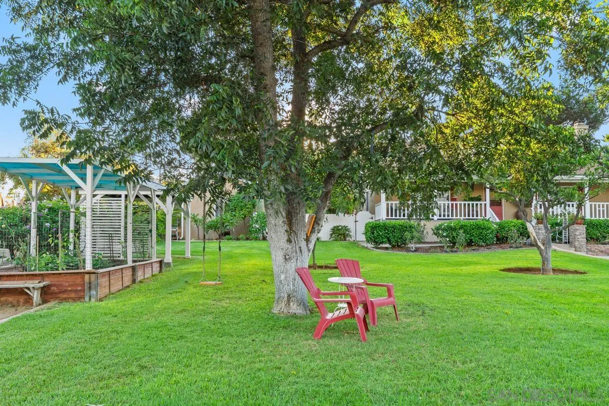 1675 Chase Lane El Cajon, CA 92020 - Photo 9 of 32 a view of a house with backyard and a slide