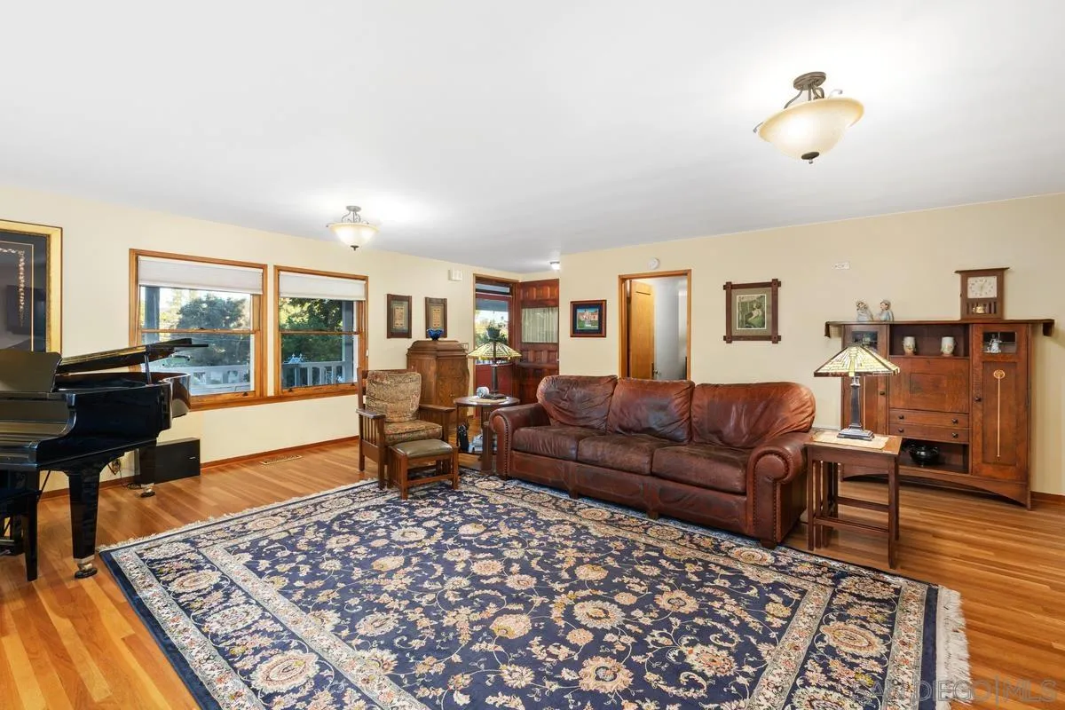 1675 Chase Lane El Cajon, CA 92020 - Photo 10 of 32 a living room with furniture and a rug