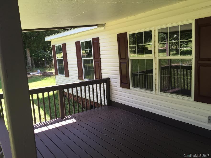 1758 Millen Road Chester, SC 29706 - Photo 2 of 11 a view of a deck with wooden floor and floor to ceiling window