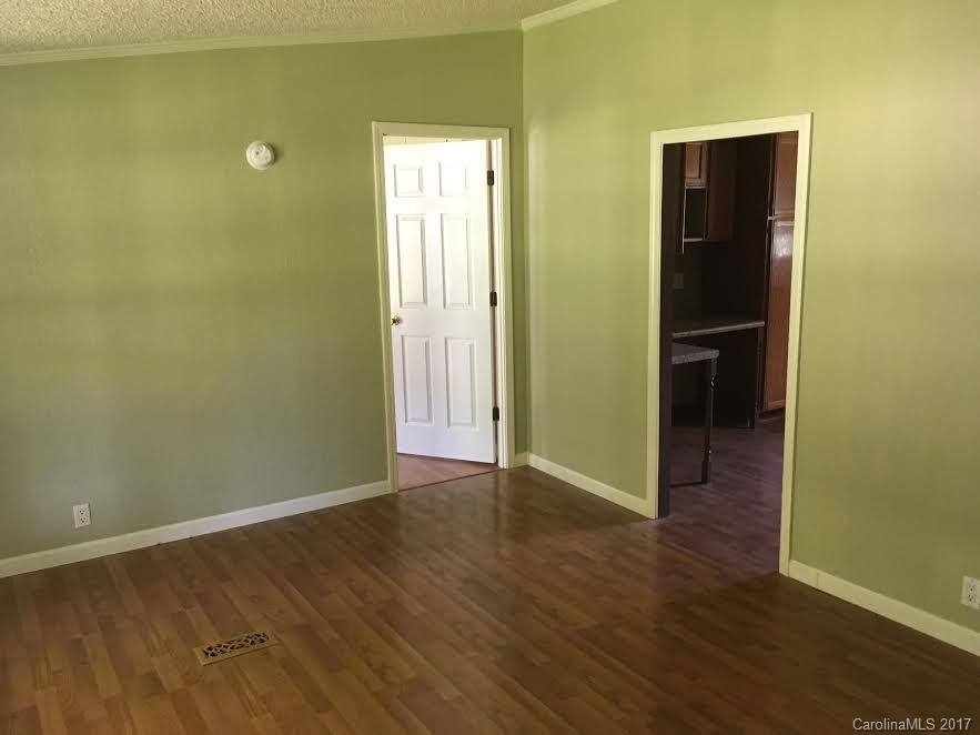 1758 Millen Road Chester, SC 29706 - Photo 3 of 11 an empty room with wooden floor and closet