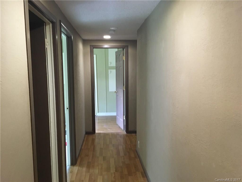 1758 Millen Road Chester, SC 29706 - Photo 7 of 11 a view of hallway with wooden floor