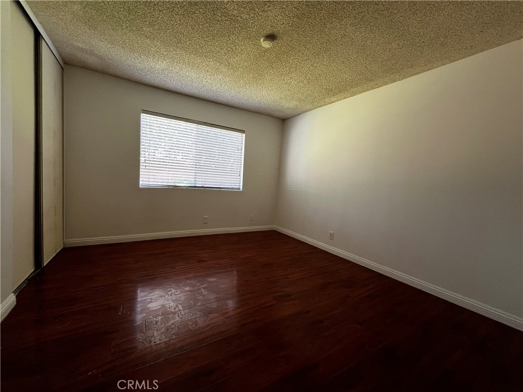 20524 Missionary Ridge Street Walnut, CA 91789 - Photo 15 of 26 an empty room with wooden floor and windows