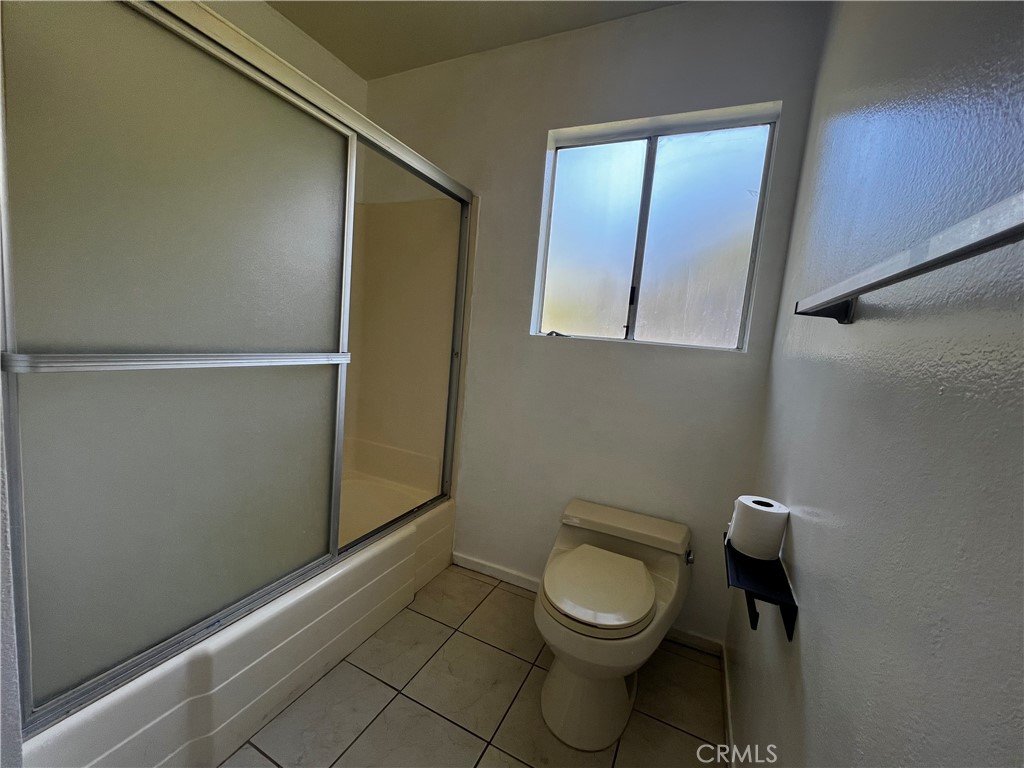20524 Missionary Ridge Street Walnut, CA 91789 - Photo 16 of 26 a bathroom with a toilet and a mirror