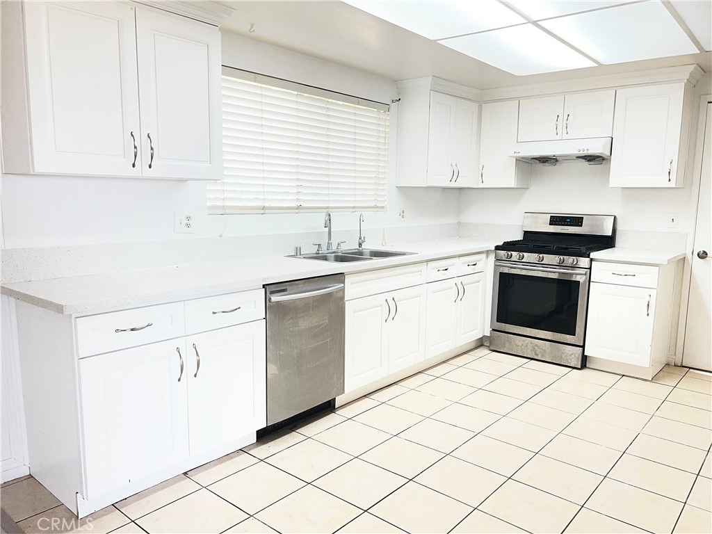 20524 Missionary Ridge Street Walnut, CA 91789 - Photo 8 of 26 a kitchen with cabinets appliances and a sink