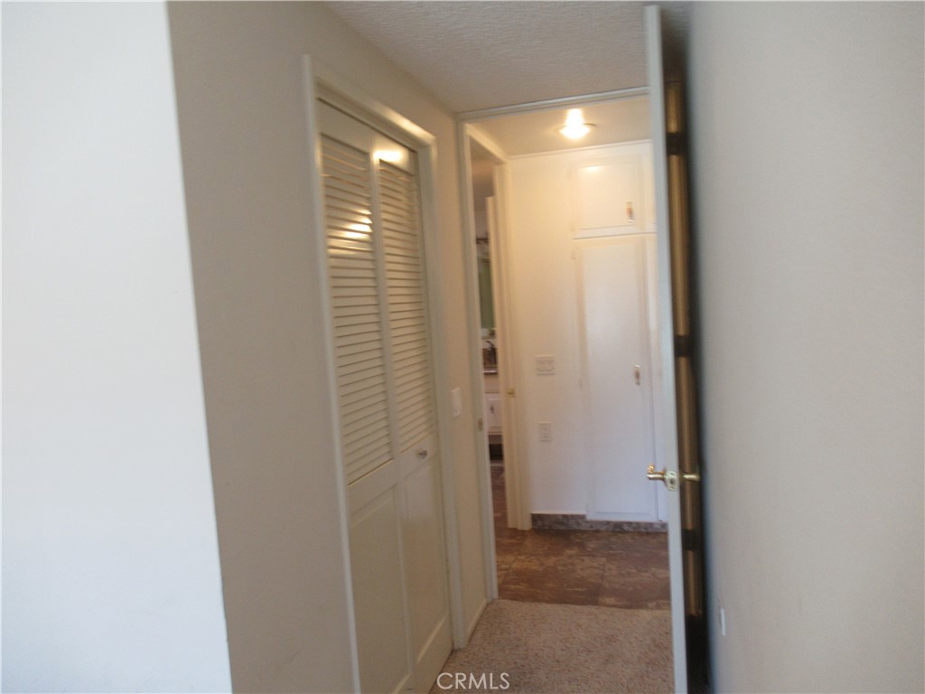 1230 Scioto Road Seal Beach, CA 90740 - Photo 25 of 27 a view of a bathroom from a hallway