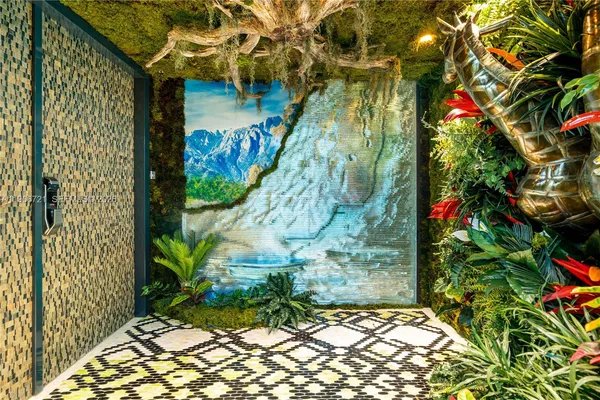 a flower plants in front of a door