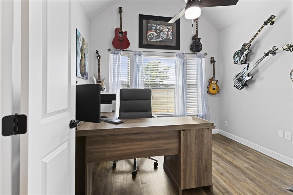 1195 Hog Town Road Collinsville, TX 76233 - Photo 19 of 37 a view of hall way with furniture and wooden floor