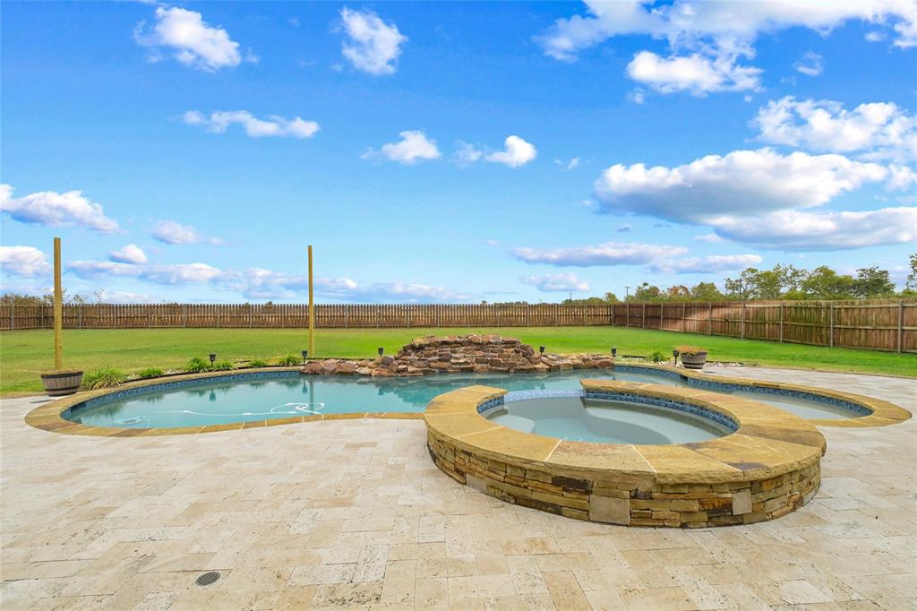 1195 Hog Town Road Collinsville, TX 76233 - Photo 28 of 37 a view of a swimming pool with a yard