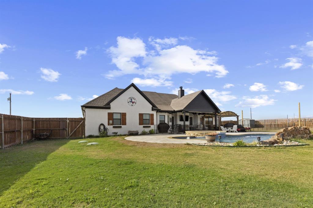 1195 Hog Town Road Collinsville, TX 76233 - Photo 29 of 37 a front view of house with yard and entertaining space