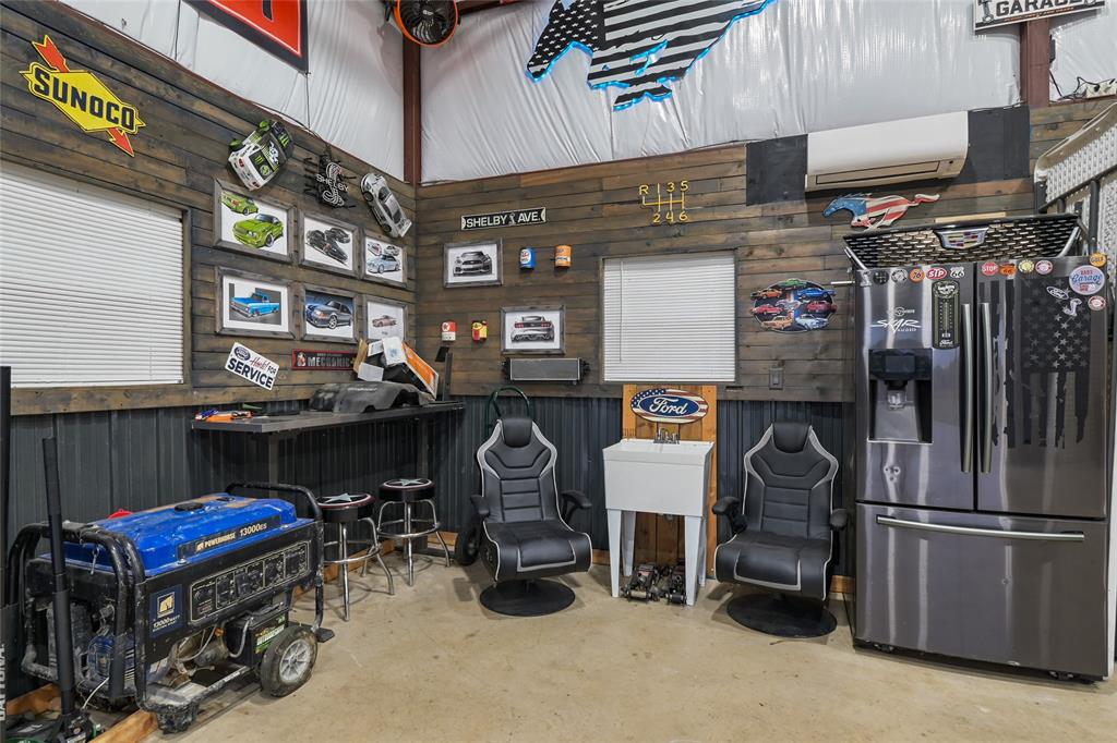 1195 Hog Town Road Collinsville, TX 76233 - Photo 35 of 37 a view of a store room with furniture