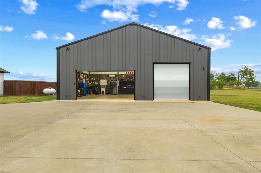 1195 Hog Town Road Collinsville, TX 76233 - Photo 37 of 37 a house with a outdoor space