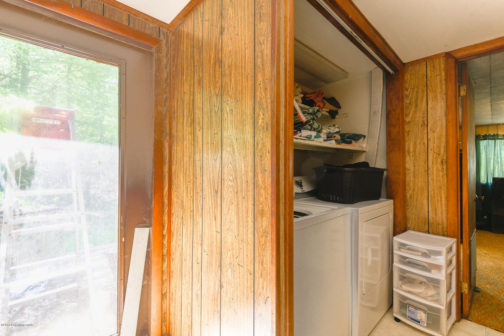 7055 Running Valley Road Stroudsburg, PA 18360 - Photo 20 of 23 a view of walk in closet with clothes and shoes