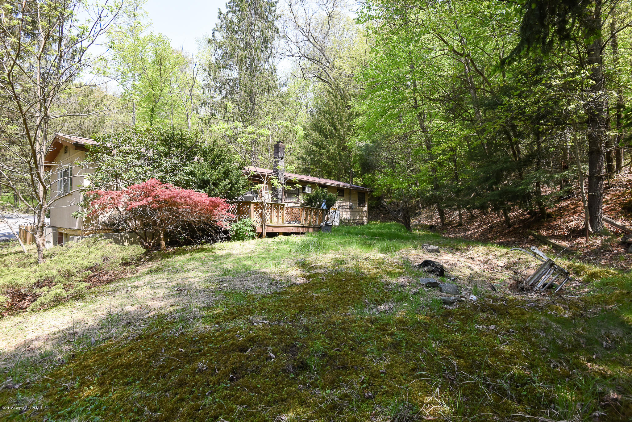 7055 Running Valley Road Stroudsburg, PA 18360 - Photo 5 of 23 a view of a house with a yard