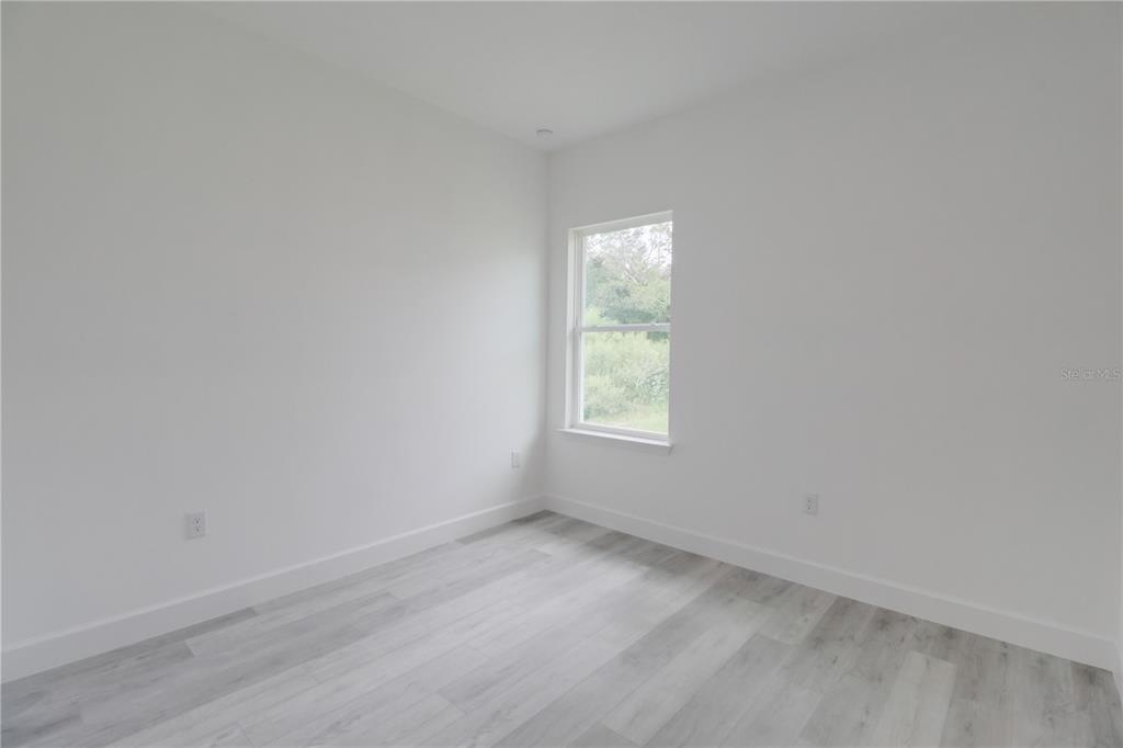 16816 Southwest 41st Avenue Road Ocala, FL 34473 - Photo 15 of 21 an empty room with a window