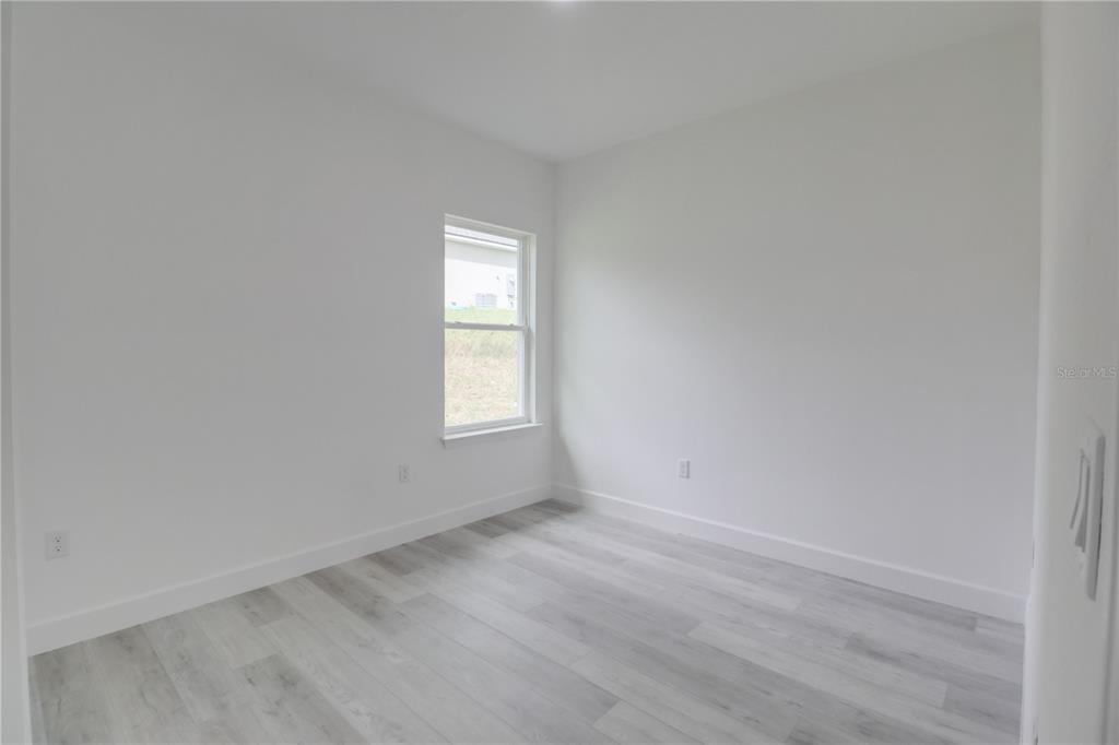 16816 Southwest 41st Avenue Road Ocala, FL 34473 - Photo 16 of 21 an empty room with a window