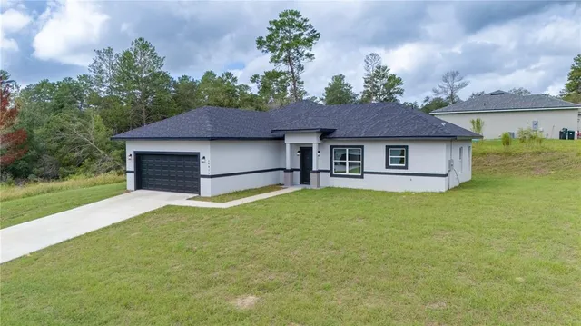 a house view with a garden space