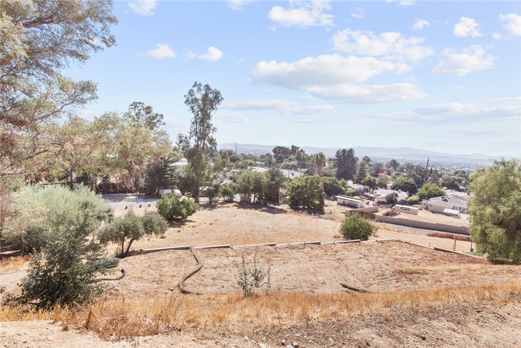 11945 Pendleton Road Yucaipa, CA 92399 - Photo 27 of 56 lot goes to where the top of the blockwall starts.