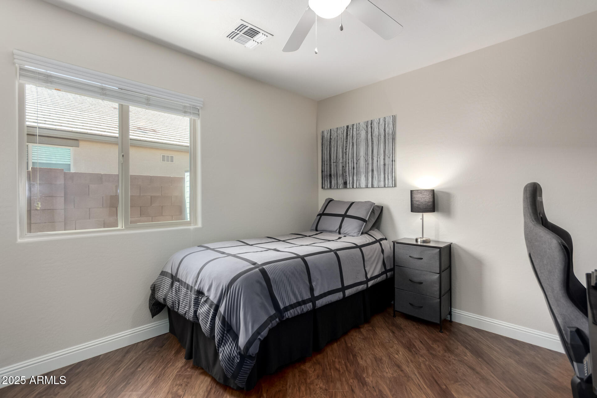 2169 East Gillcrest Road Gilbert, AZ 85298 - Photo 12 of 77 a bedroom with a bed next to a window