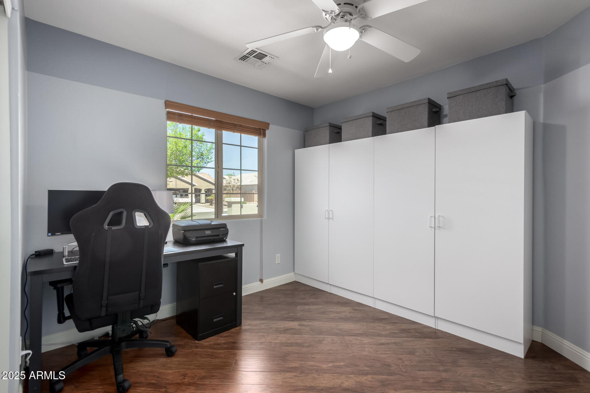 2169 East Gillcrest Road Gilbert, AZ 85298 - Photo 30 of 77 a view of a workspace with furniture and a window