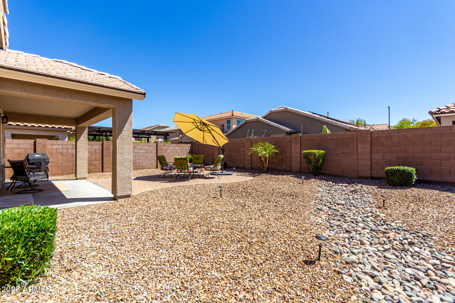 2169 East Gillcrest Road Gilbert, AZ 85298 - Photo 34 of 77 a view of a house with a yard